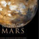 L'image montre une représentation artistique de la planète Mars, probablement avec des couleurs rouges et orangées qui évoquent son atmosphère. Le texte en haut indique "Au plus près de la planète Mars", suggérant un projet ou un livre axé sur l'exploration ou l'étude de Mars. Le nom "Philippe Morel" est mentionné, ce qui indique qu'il a contribué à ce livre. L'ensemble évoque un intérêt pour l'astronomie et la découverte spatiale.