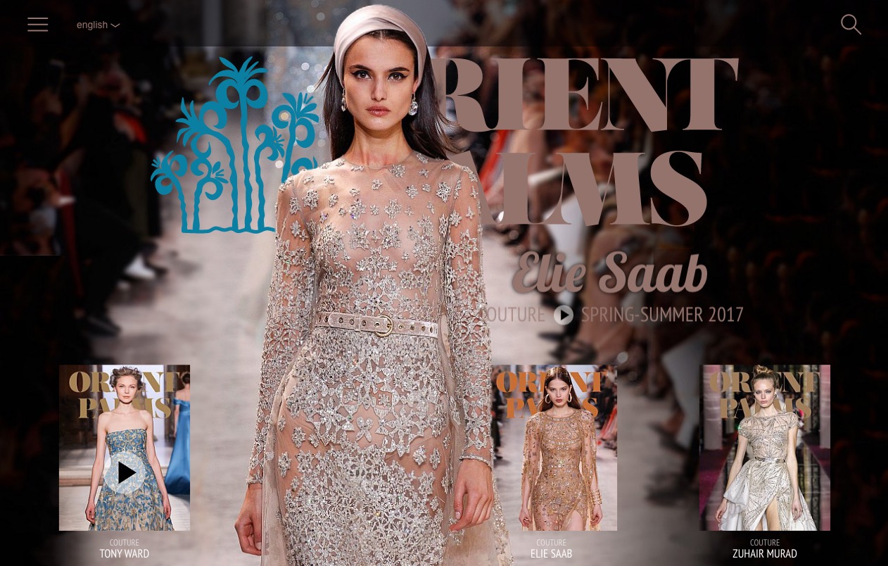 L'image montre une mannequin sur le podium, portant une robe élégante ornée de broderies complexes et de paillettes, représentant une collection de haute couture pour le printemps-été 2017 d'Elie Saab. En bas de l'image, il y a des vignettes représentant d'autres créations, avec des noms de créateurs comme Tony Ward et Zuhair Murad. Le thème de l'événement semble être "Orient" avec des motifs évoquant une ambiance exotique.