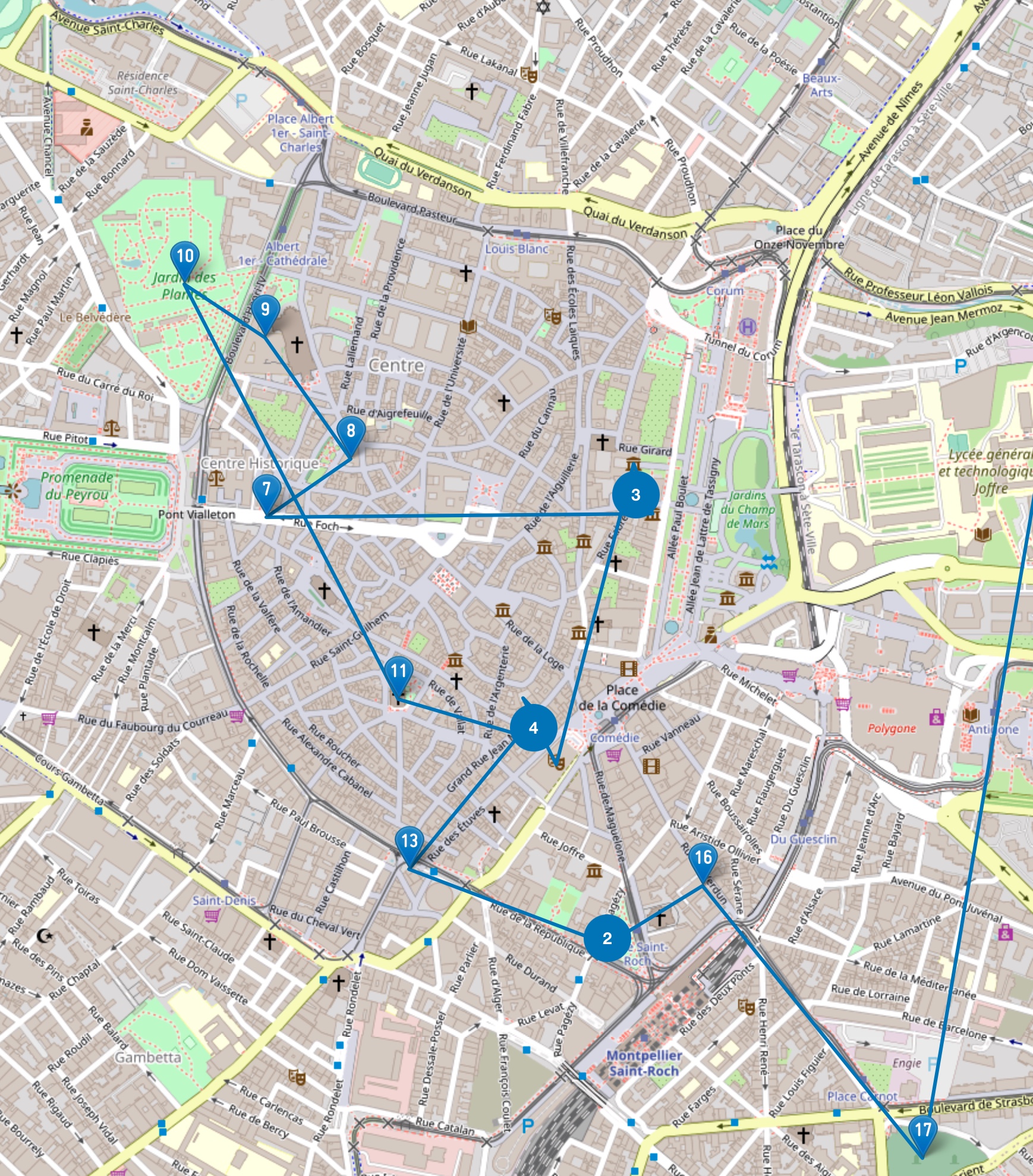 L'image montre une carte détaillée d'une ville, avec un accent sur un secteur central. On peut y voir divers points d'intérêt, numérotés de 1 à 16, connectés par des lignes bleues. Ces points pourraient représenter des lieux spécifiques, des attractions touristiques ou des étapes d'un itinéraire. La carte comprend également des rues, des bâtiments et peut-être des parcs ou d'autres éléments géographiques.