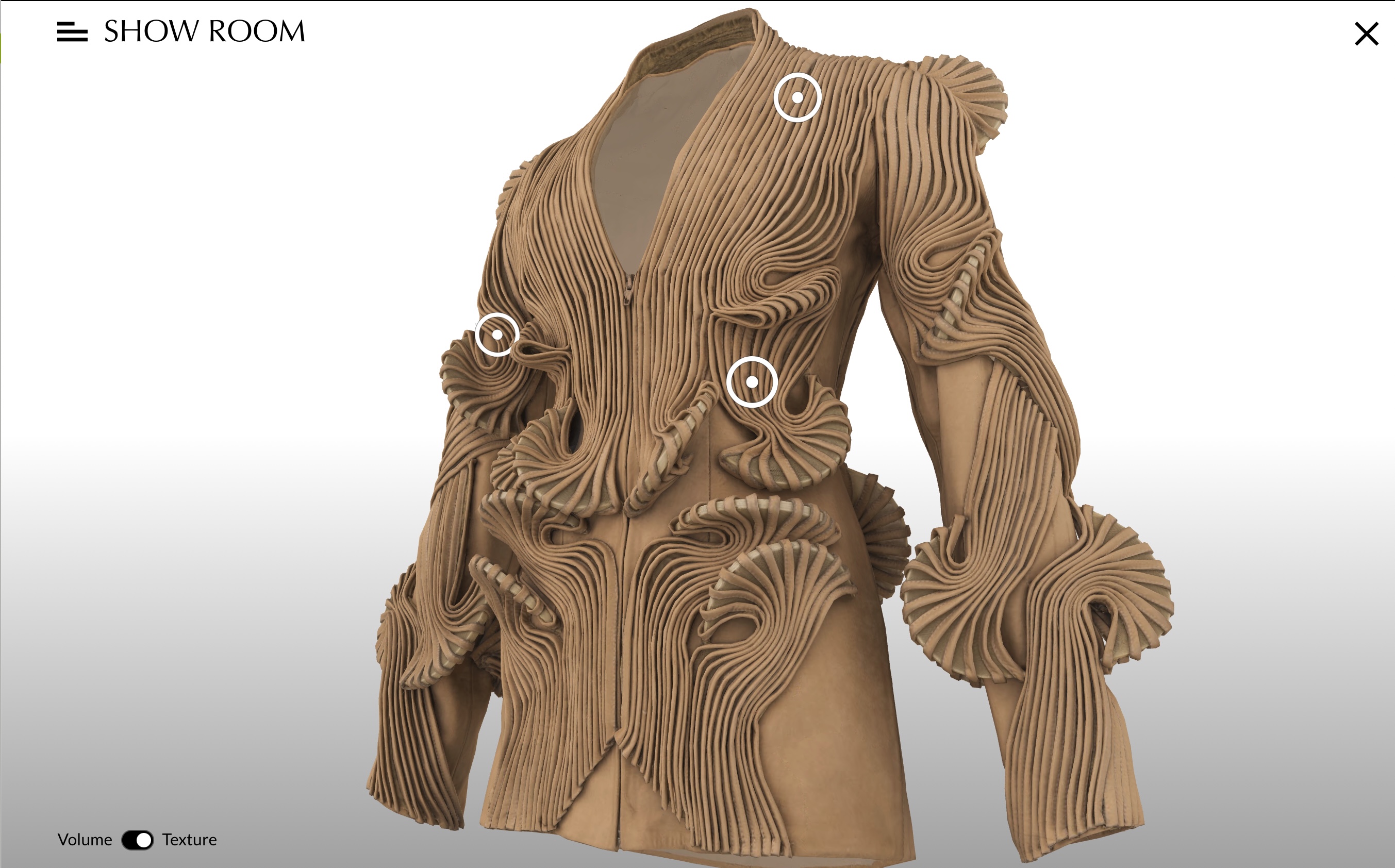 L'image montre un manteau ou une veste au design avant-gardiste. Ce vêtement est largement orné de motifs texturés en relief, créant un effet sculptural. Les formes ondulées et les détails en spirale ajoutent de la profondeur et du volume à l'ensemble, tandis que la couleur beige neutre contribue à l'élégance de la pièce. La coupe est moderne, avec des manches larges, ce qui renforce le caractère audacieux de cette création.