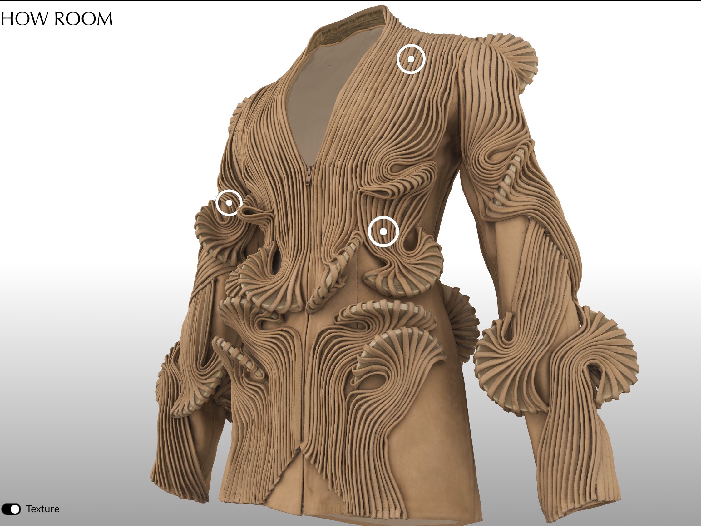 L'image montre un manteau ou une veste au design avant-gardiste. Ce vêtement est largement orné de motifs texturés en relief, créant un effet sculptural. Les formes ondulées et les détails en spirale ajoutent de la profondeur et du volume à l'ensemble, tandis que la couleur beige neutre contribue à l'élégance de la pièce. La coupe est moderne, avec des manches larges, ce qui renforce le caractère audacieux de cette création.