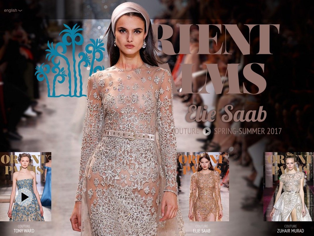L'image montre une mannequin sur le podium, portant une robe élégante ornée de broderies complexes et de paillettes, représentant une collection de haute couture pour le printemps-été 2017 d'Elie Saab. En bas de l'image, il y a des vignettes représentant d'autres créations, avec des noms de créateurs comme Tony Ward et Zuhair Murad. Le thème de l'événement semble être "Orient" avec des motifs évoquant une ambiance exotique.